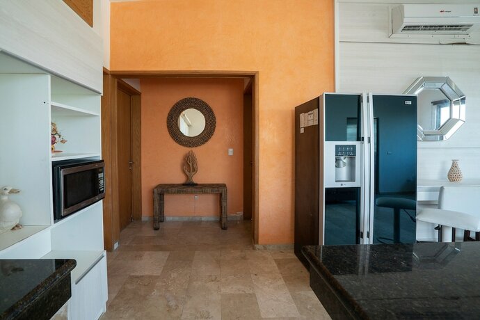 Imagen de la habitación del Hotel Capital O Cancun International Airport 24/7,. Foto 11