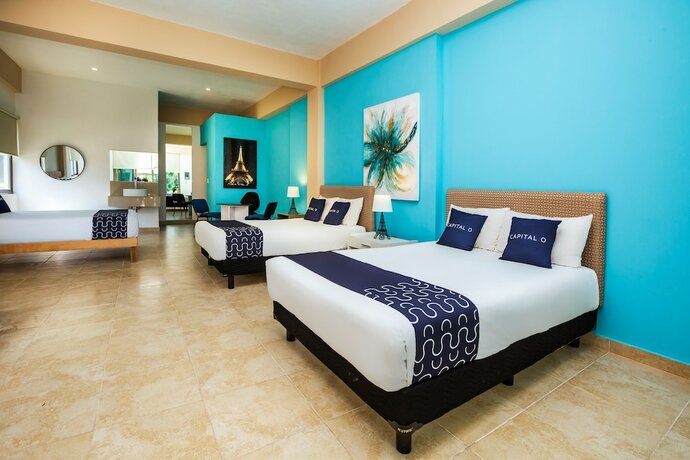 Imagen de la habitación del Hotel Capital O Cancun International Airport 24/7,. Foto 12