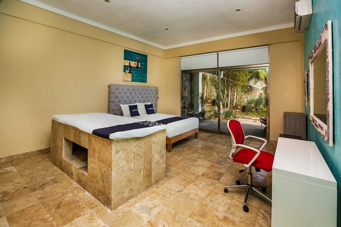 Imagen de la habitación del Hotel Capital O Cancun International Airport 24/7,. Foto 16