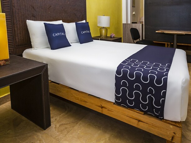 Imagen de la habitación del Hotel Capital O Cancun International Airport 24/7,. Foto 17