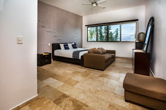 Imagen de la habitación del Hotel Capital O Cancun International Airport 24/7,. Foto 19