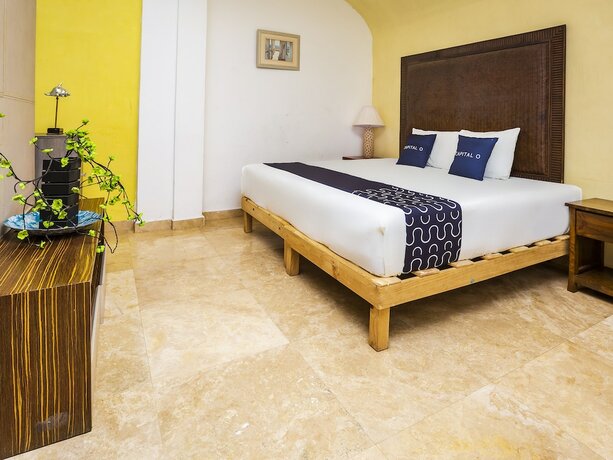 Imagen de la habitación del Hotel Capital O Cancun International Airport 24/7,. Foto 20