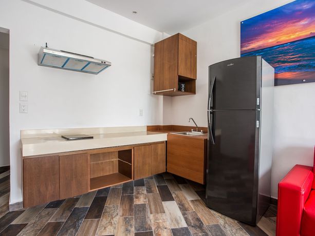 Imagen de la habitación del Hotel Capital O Cancun Ocean View, Cancún. Foto 4