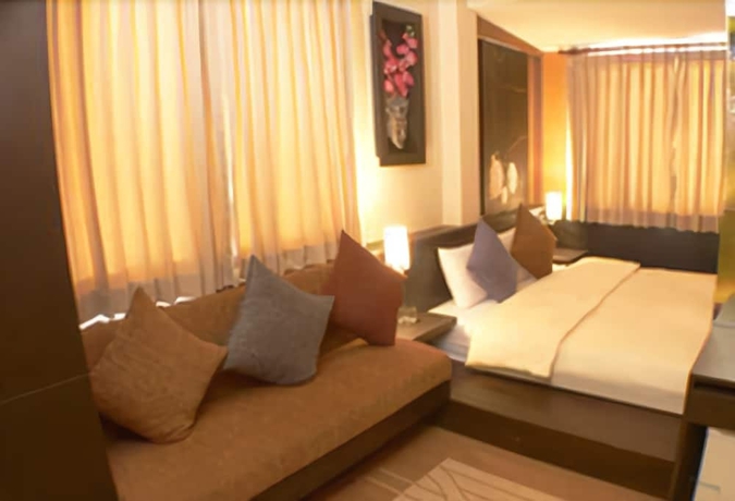 Imagen de la habitación del Hotel Capital O Diamond House Khaosan. Foto 11