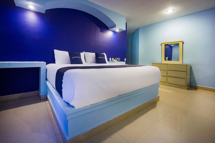 Imagen de la habitación del Hotel Capital O Diro, Monterrey. Foto 10