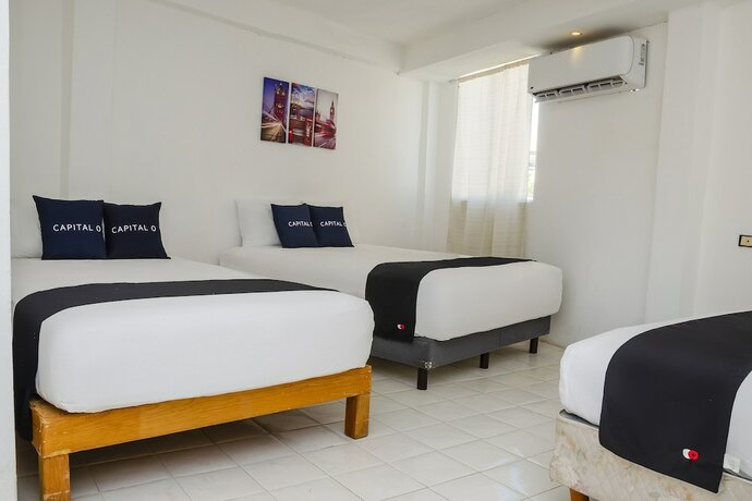 Imagen de la habitación del Hotel Capital O Dos Mares, Cabo San Lucas. Foto 12