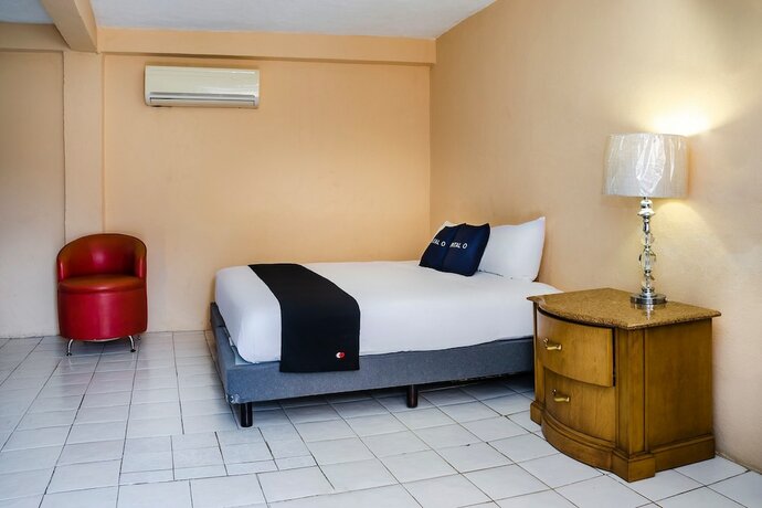 Imagen de la habitación del Hotel Capital O Dos Mares, Cabo San Lucas. Foto 13