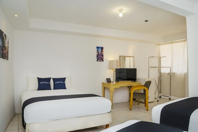 Imagen de la habitación del Hotel Capital O Dos Mares, Cabo San Lucas. Foto 19