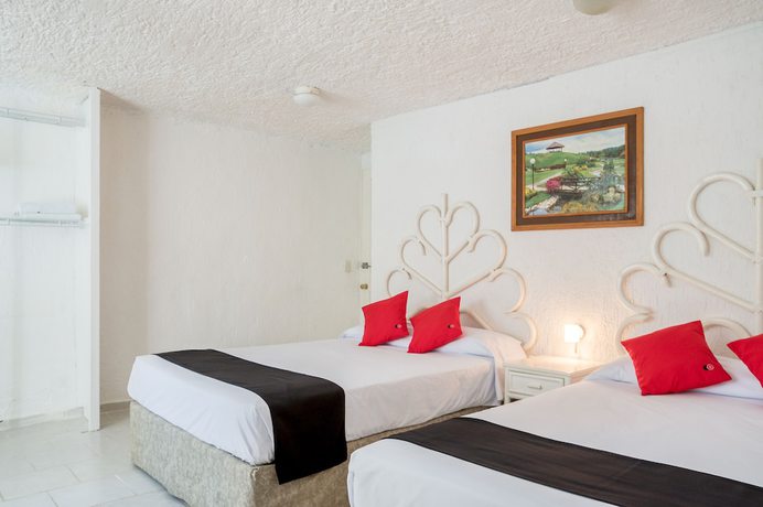 Imagen de la habitación del Hotel Capital O Farallon Inn, Cancún. Foto 2