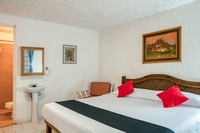 Imagen de la habitación del Hotel Capital O Farallon Inn, Cancún. Foto 6