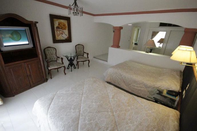 Imagen de la habitación del Hotel Capital O Gran Hotel Campestre. Foto 4