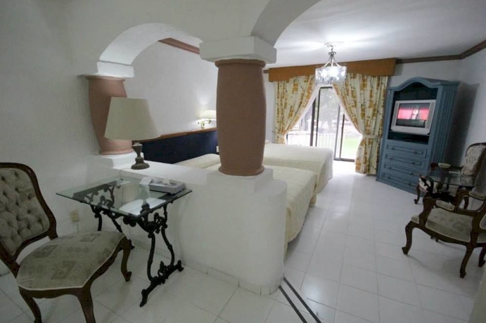 Imagen de la habitación del Hotel Capital O Gran Hotel Campestre. Foto 6