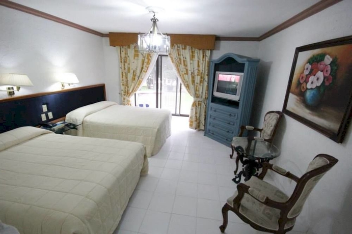Imagen de la habitación del Hotel Capital O Gran Hotel Campestre. Foto 7