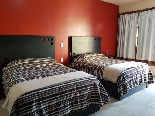 Imagen de la habitación del Hotel Capital O Hotel Emperadores Inn, Atlixco. Foto 7