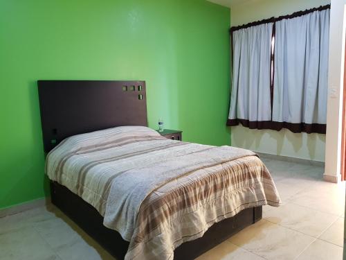 Imagen de la habitación del Hotel Capital O Hotel Emperadores Inn, Atlixco. Foto 9