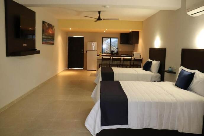 Imagen de la habitación del Hotel Capital O Hotel Jazuli. Foto 6