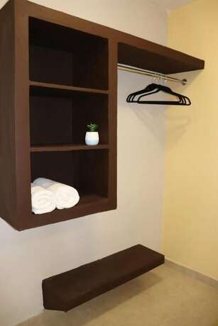 Imagen de la habitación del Hotel Capital O Hotel Jazuli. Foto 9