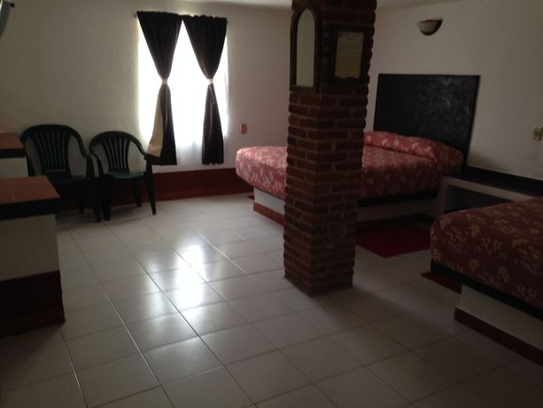 Imagen de la habitación del Hotel Capital O Hotel Meson Del Rio, Tepotzotlan. Foto 6