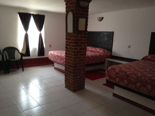 Imagen de la habitación del Hotel Capital O Hotel Meson Del Rio, Tepotzotlan. Foto 9