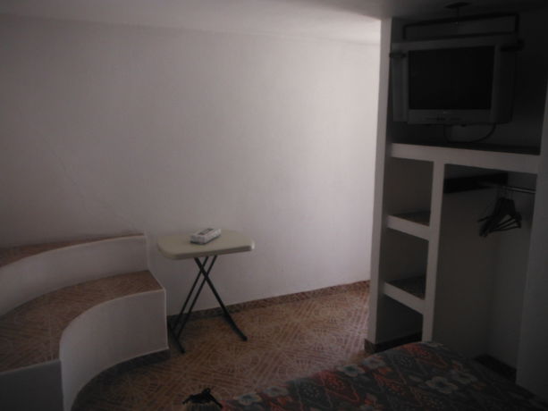 Imagen de la habitación del Hotel Capital O Hotel Meson Del Rio, Tepotzotlan. Foto 11