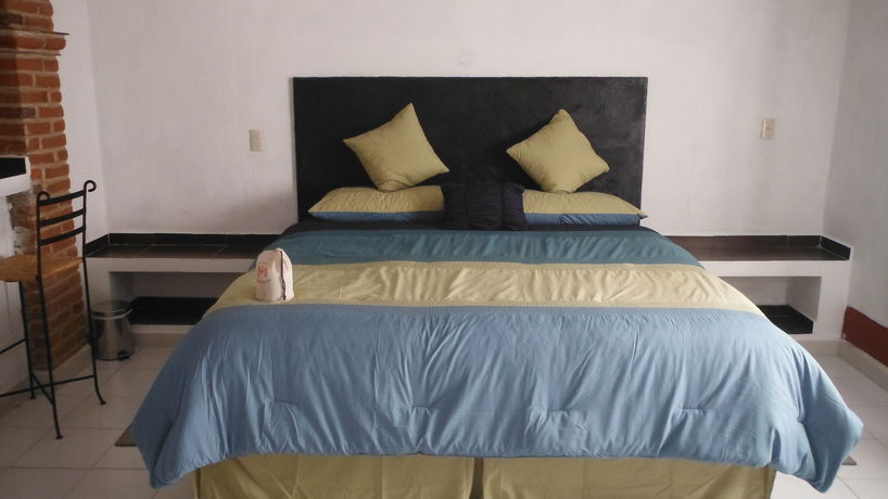 Imagen de la habitación del Hotel Capital O Hotel Meson Del Rio, Tepotzotlan. Foto 12