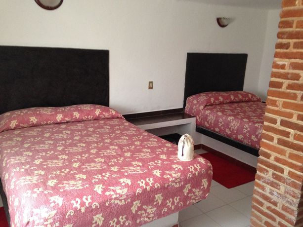 Imagen de la habitación del Hotel Capital O Hotel Meson Del Rio, Tepotzotlan. Foto 13