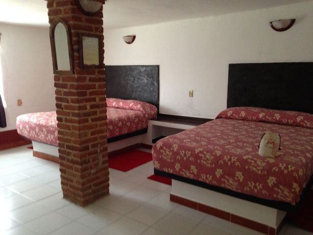 Imagen de la habitación del Hotel Capital O Hotel Meson Del Rio, Tepotzotlan. Foto 14