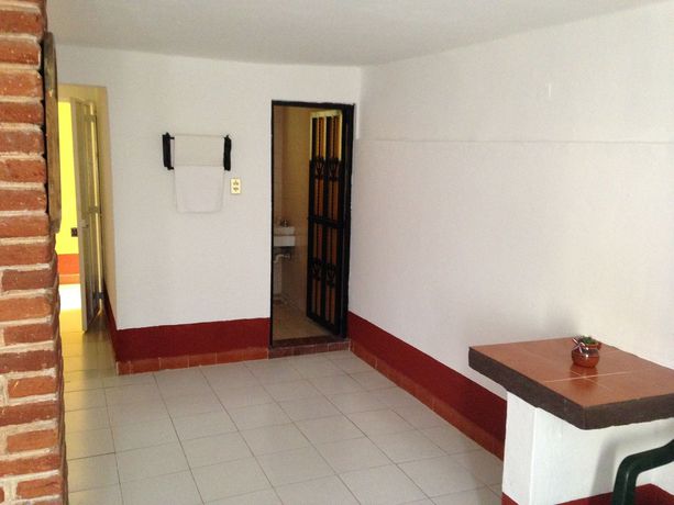 Imagen de la habitación del Hotel Capital O Hotel Meson Del Rio, Tepotzotlan. Foto 15