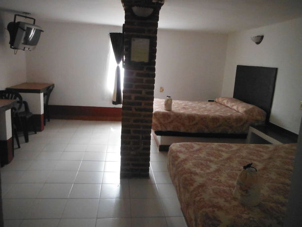 Imagen de la habitación del Hotel Capital O Hotel Meson Del Rio, Tepotzotlan. Foto 16