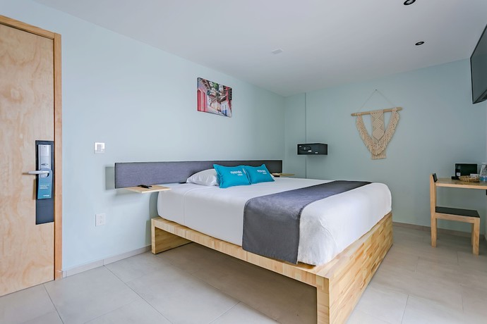 Imagen de la habitación del Hotel Capital O Hotel Terraza 158. Foto 3