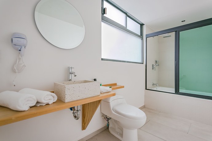 Imagen de la habitación del Hotel Capital O Hotel Terraza 158. Foto 11