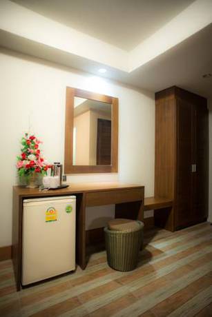 Imagen de la habitación del Hotel Capital O Ja Siam City. Foto 3