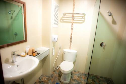 Imagen de la habitación del Hotel Capital O Ja Siam City. Foto 4