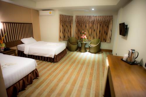 Imagen de la habitación del Hotel Capital O Ja Siam City. Foto 5