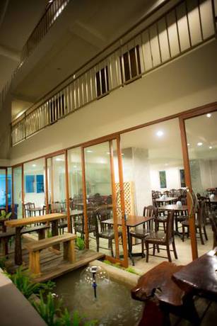 Imagen del bar/restaurante del Hotel Capital O Ja Siam City. Foto 2