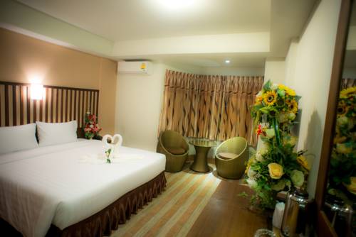 Imagen de la habitación del Hotel Capital O Ja Siam City. Foto 7