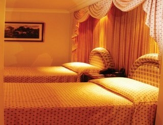 Imagen de la habitación del Hotel Capital O La Estancia. Foto 3