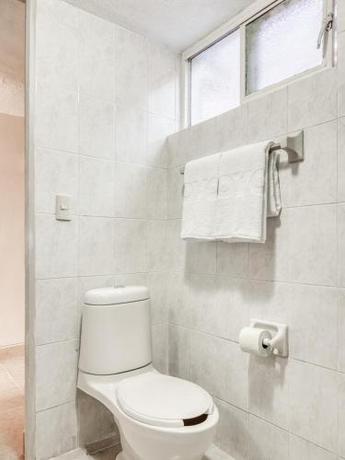 Imagen de la habitación del Hotel Capital O La Siesta. Foto 7