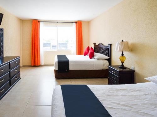 Imagen de la habitación del Hotel Capital O Los Caracoles, Acapulco. Foto 18