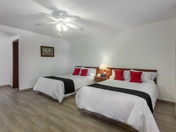 Imagen de la habitación del Hotel Capital O Mansión Los Arcos, Aguilares. Foto 3