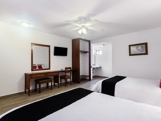 Imagen de la habitación del Hotel Capital O Mansión Los Arcos, Aguilares. Foto 6