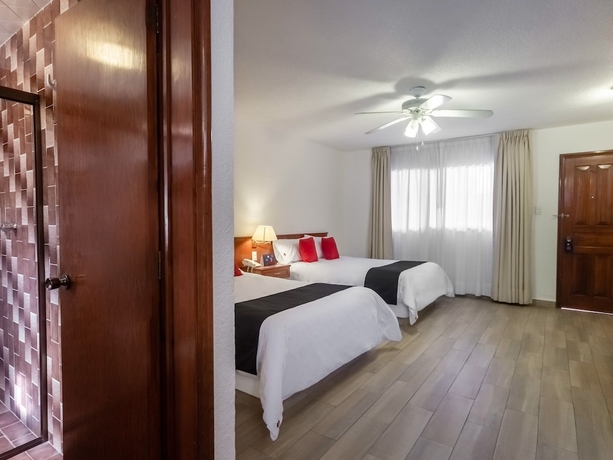 Imagen de la habitación del Hotel Capital O Mansión Los Arcos, Aguilares. Foto 7