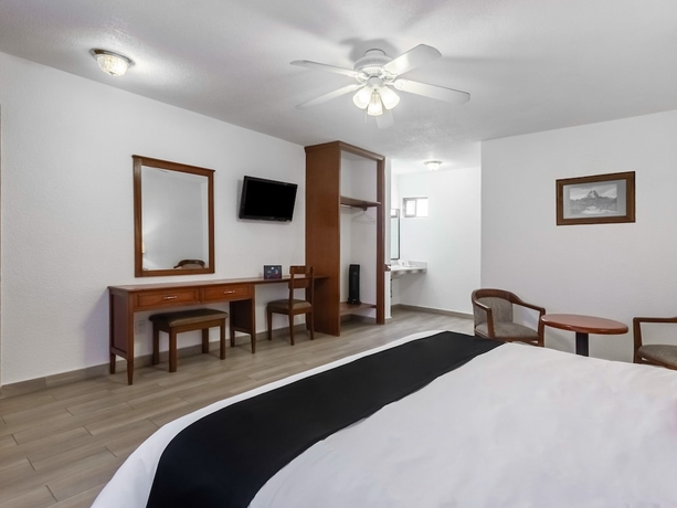 Imagen de la habitación del Hotel Capital O Mansión Los Arcos, Aguilares. Foto 8