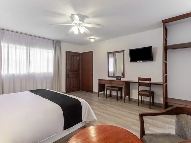 Imagen de la habitación del Hotel Capital O Mansión Los Arcos, Aguilares. Foto 9