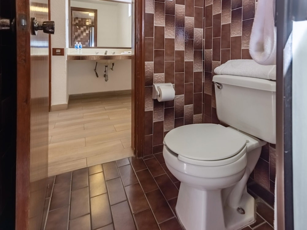 Imagen de la habitación del Hotel Capital O Mansión Los Arcos, Aguilares. Foto 10