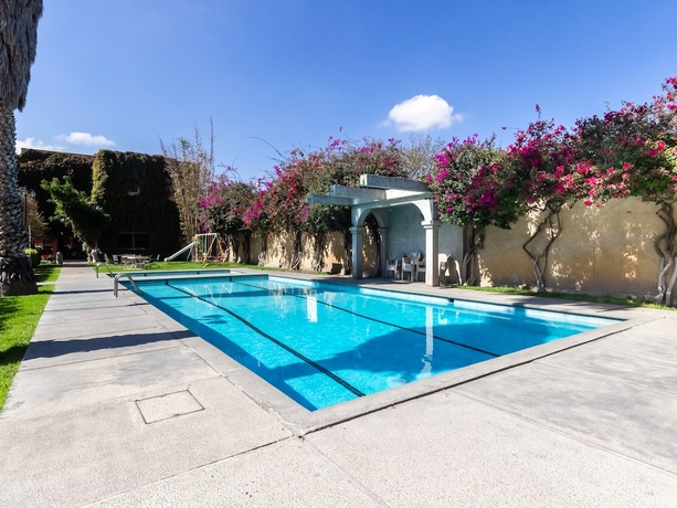 Imagen de la piscina del Hotel Capital O Mansión Los Arcos, Aguilares. Foto 19