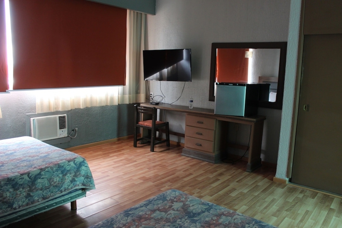 Imagen de la habitación del Hotel Capital O Nueva Galicia, Guadalajara centro downtown. Foto 10