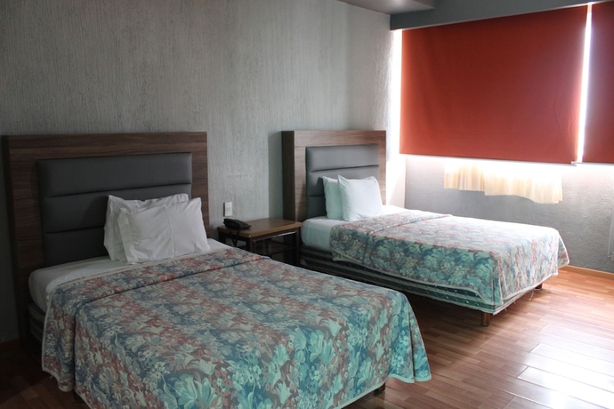 Imagen de la habitación del Hotel Capital O Nueva Galicia, Guadalajara centro downtown. Foto 11