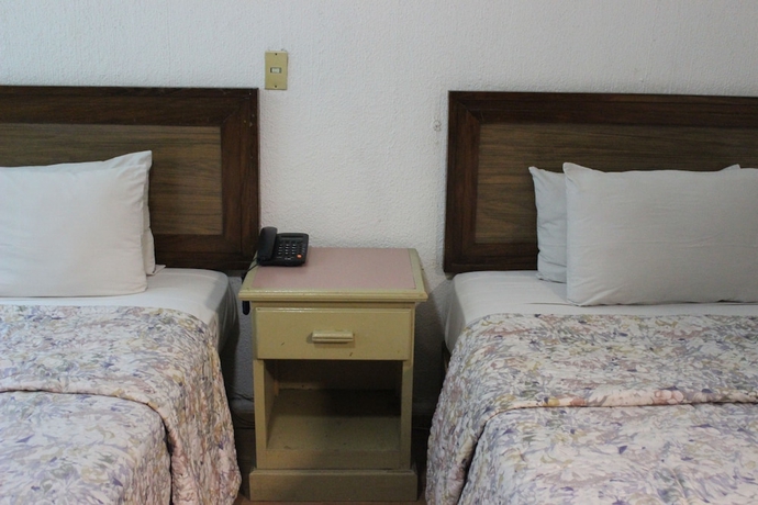 Imagen de la habitación del Hotel Capital O Nueva Galicia, Guadalajara centro downtown. Foto 13