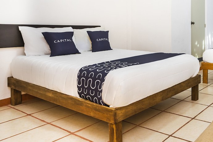 Imagen de la habitación del Hotel Capital O Oxtankah,chetumal bay. Foto 2